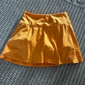 All in Motion Vibrant Orange Skort